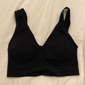 Nylon light support bra, includes pads, never worn